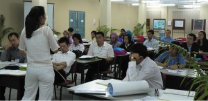 Sherilyn Siy (standing), a member of the SYLFF Fellows Council, leading a workshop.