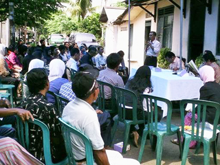 A meeting of community residents and local-government