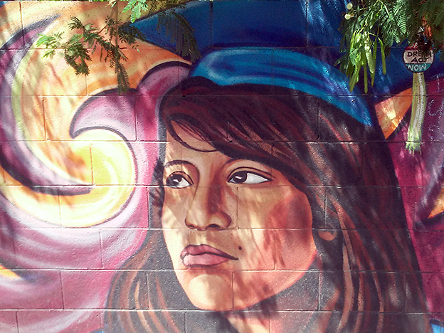Mural showing a Latina student, Phoenix.