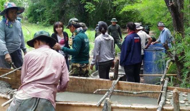 Community volunteers provided the labor and local materials for dam construction.