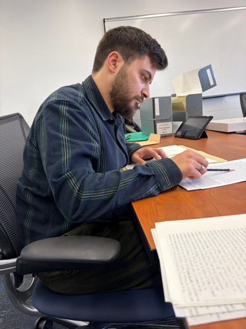 Working inside the Caroline A. Laudati Conference Room, Langson Library, UC Irvine.